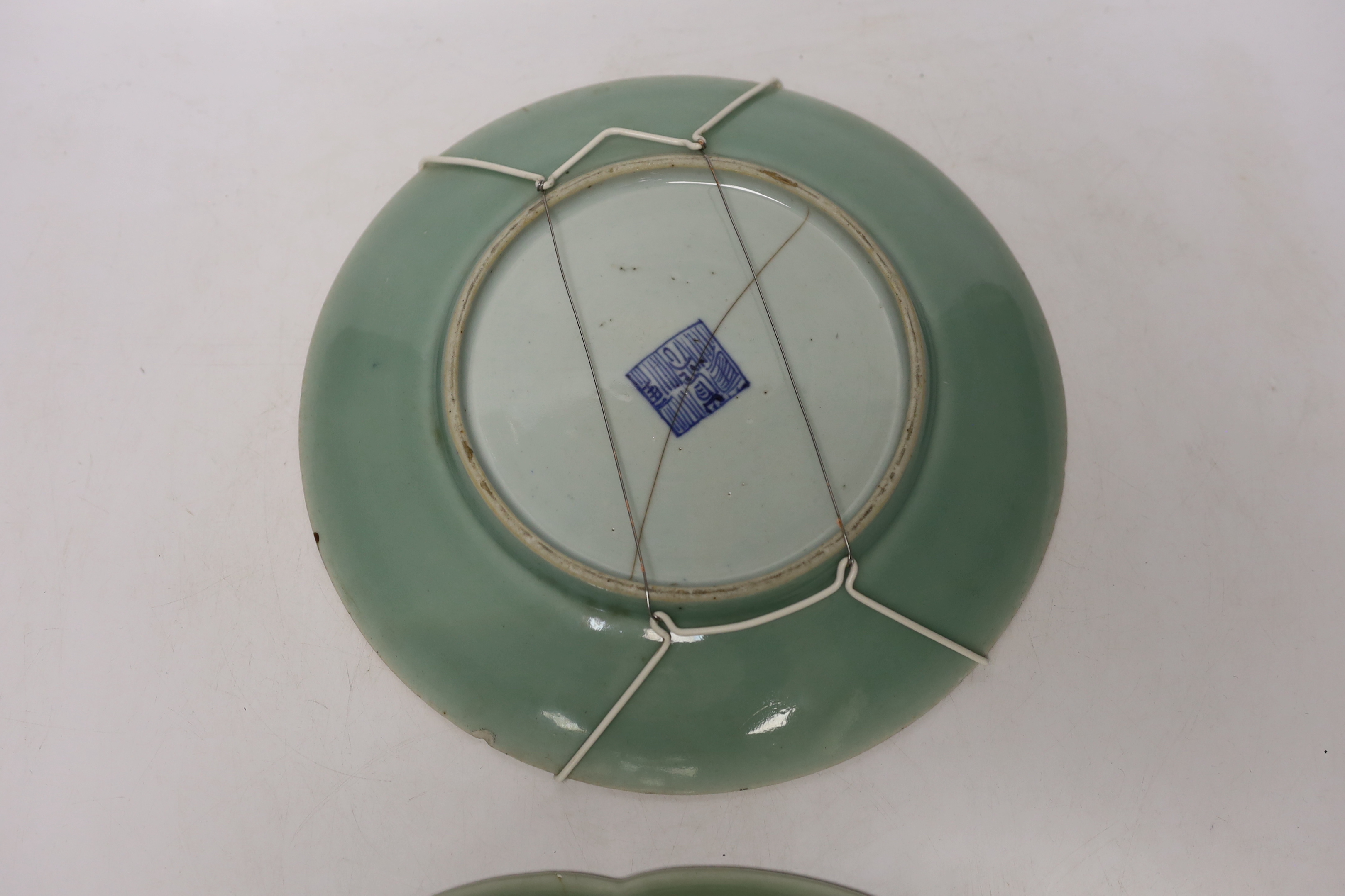 Eight 19th century Chinese celadon glazed famille rose dishes, largest 26cm